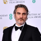 Joaquin Phoenix with his Best Actor award for “The Joker’ poses in the Winners Room during the EE British Academy Film Awards 2020 on February 02, 2020 in London, England.